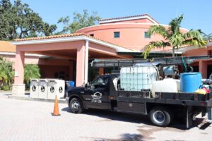 pressure washing truck cleaning the public library